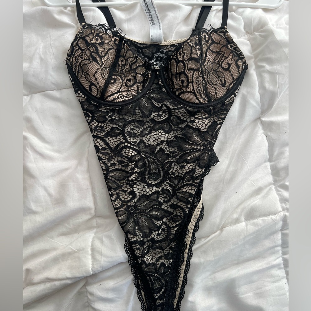 Laced body suit